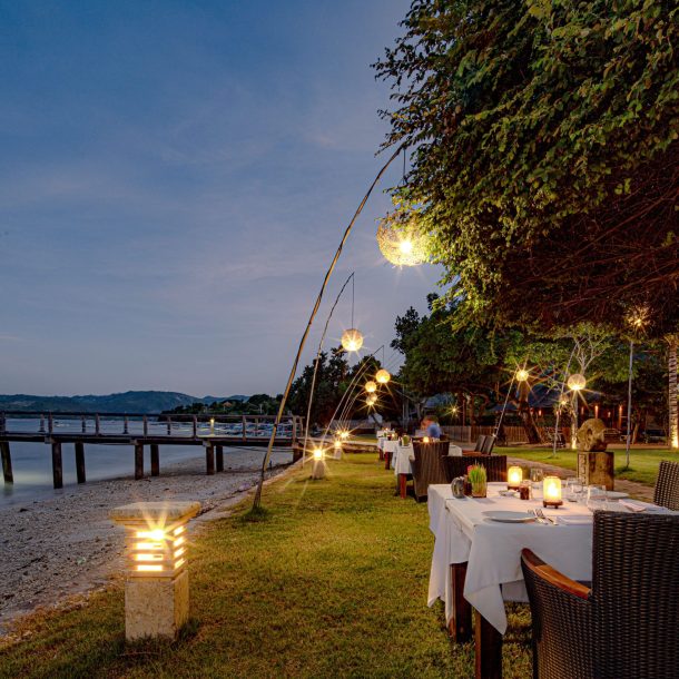 Beachfront dining area at Kokomo Resort Gili Gede